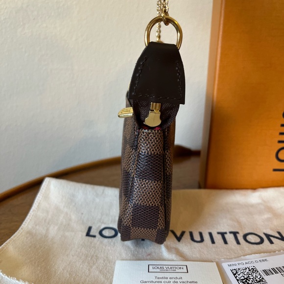 Unused Louis Vuitton Mini Pochette in Damier Ebene - Picture 9 of 11